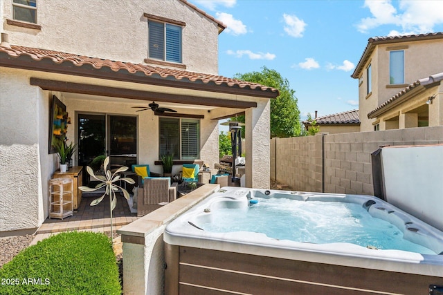 13088 N 91st Dr, Peoria, AZ 85381 - view of patio with ceiling fan and a hot tub
