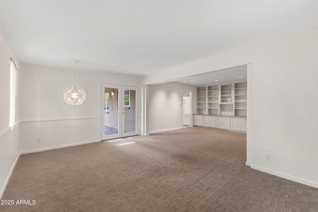 143 E Winter Dr, Phoenix, AZ 85020 - empty room featuring carpet floors and baseboards