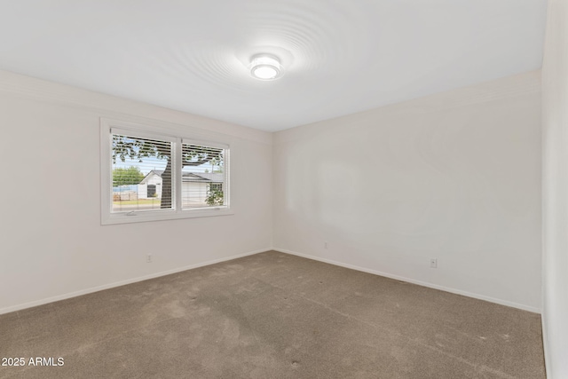 143 E Winter Dr, Phoenix, AZ 85020 - carpeted spare room featuring baseboards