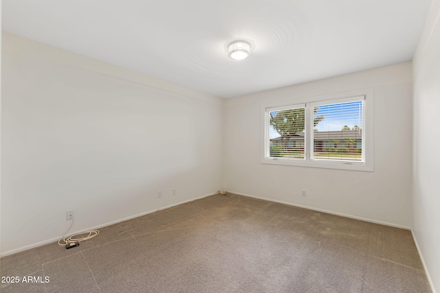 143 E Winter Dr, Phoenix, AZ 85020 - spare room with carpet and baseboards