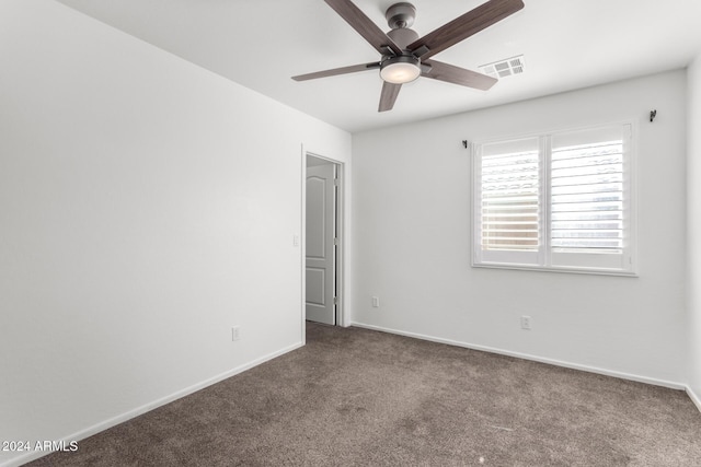 spare room with ceiling fan and carpet floors