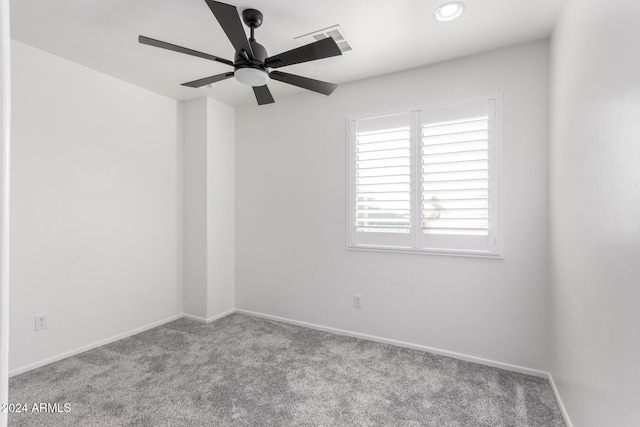 carpeted empty room with ceiling fan