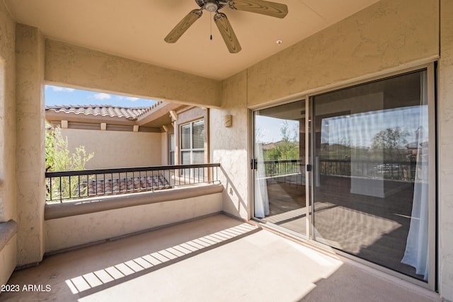 view of patio / terrace featuring a balcony and ceiling fan