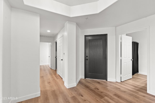 hall featuring light hardwood / wood-style flooring