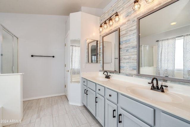 bathroom with dual vanity and tile patterned floors