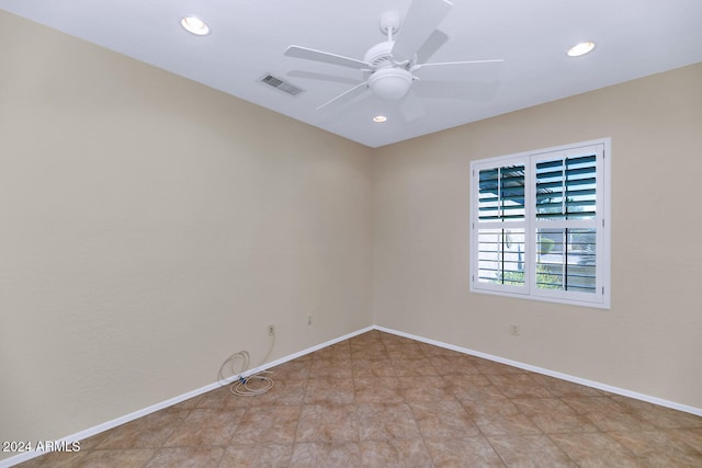 spare room featuring baseboards, visible vents, ceiling fan, and recessed lighting