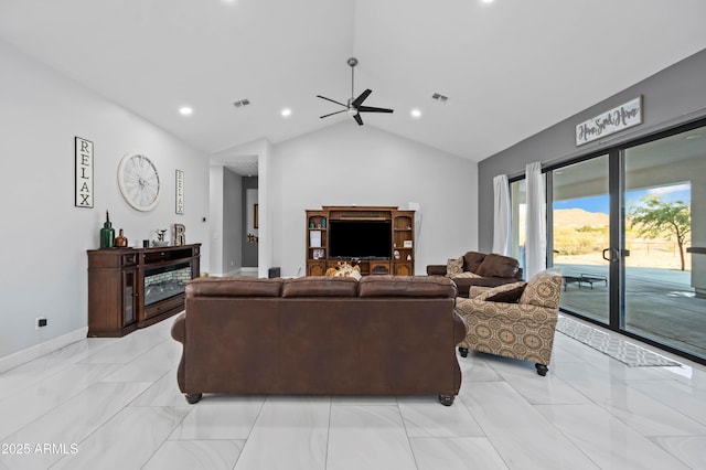 8017 S 143rd Ave, Goodyear, AZ 85338 - living area with ceiling fan, light marble finish flooring, recessed lighting, and high vaulted ceiling