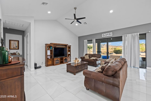 8017 S 143rd Ave, Goodyear, AZ 85338 - living area featuring healthy amount of natural light, ceiling fan, high vaulted ceiling, and recessed lighting