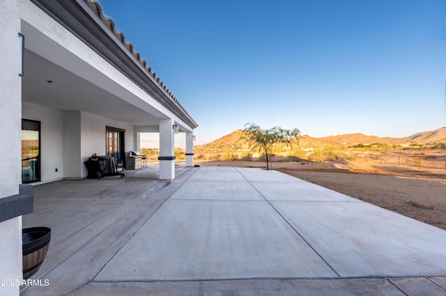 8017 S 143rd Ave, Goodyear, AZ 85338 - view of patio with a mountain view and area for grilling