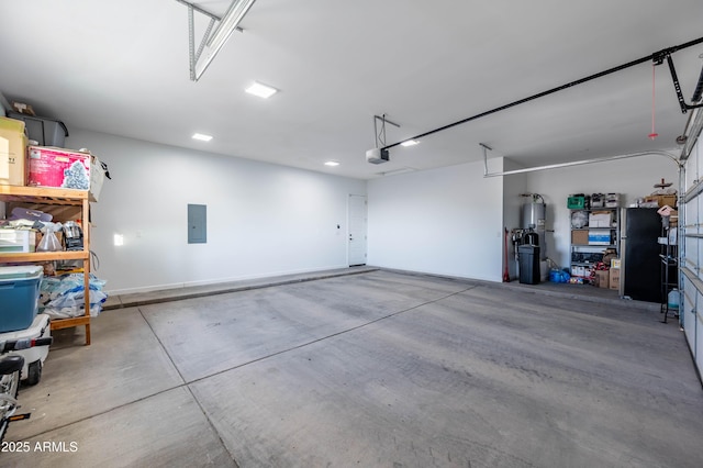 8017 S 143rd Ave, Goodyear, AZ 85338 - garage with a garage door opener, electric panel, and water heater