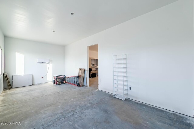 8017 S 143rd Ave, Goodyear, AZ 85338 - empty room featuring unfinished concrete floors