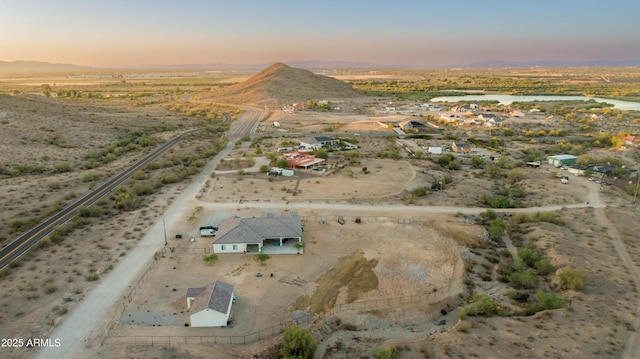 8017 S 143rd Ave, Goodyear, AZ 85338 - aerial view at dusk of a mountain view and a view of countryside