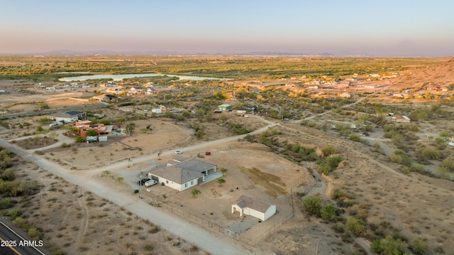 8017 S 143rd Ave, Goodyear, AZ 85338 - aerial view at dusk of a desert view, a rural view, and a mountain view