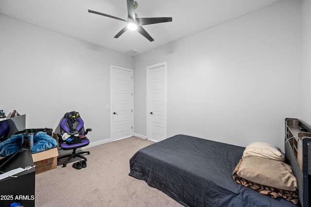 8017 S 143rd Ave, Goodyear, AZ 85338 - carpeted bedroom with baseboards and ceiling fan