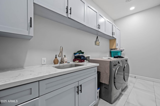 8017 S 143rd Ave, Goodyear, AZ 85338 - washroom featuring independent washer and dryer, cabinet space, and recessed lighting