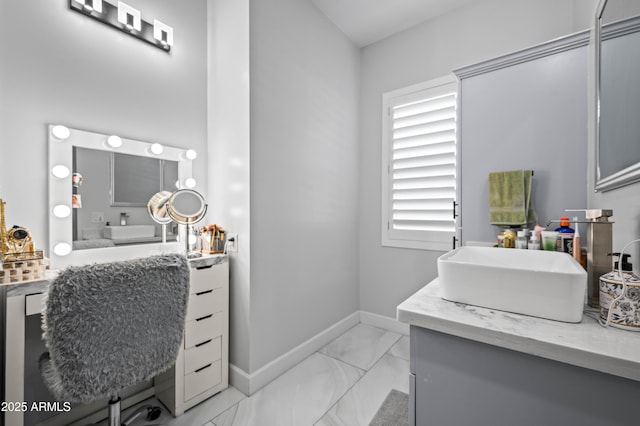 8017 S 143rd Ave, Goodyear, AZ 85338 - bathroom with vanity and marble look tile flooring