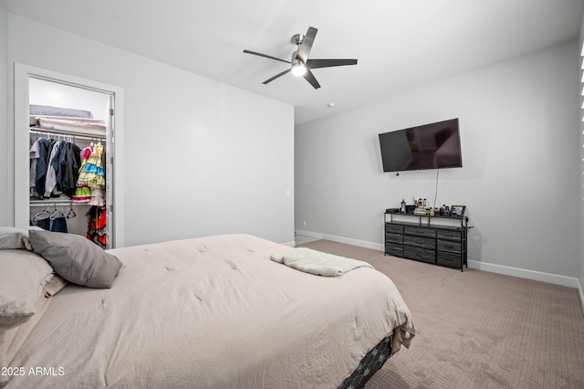 8017 S 143rd Ave, Goodyear, AZ 85338 - bedroom featuring a walk in closet, carpet, a closet, and a ceiling fan