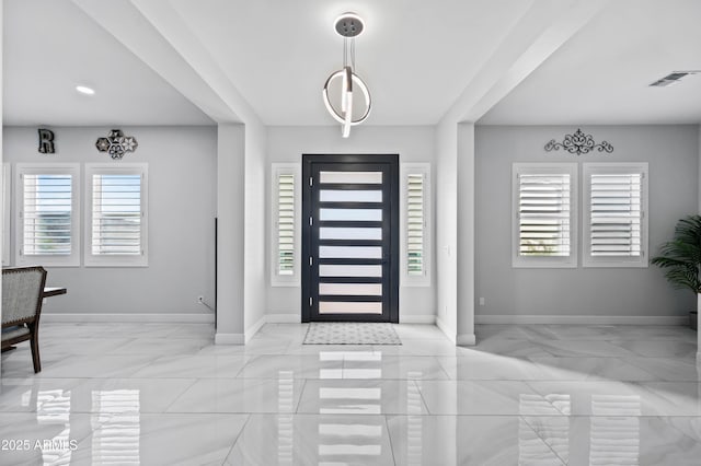 8017 S 143rd Ave, Goodyear, AZ 85338 - foyer entrance featuring healthy amount of natural light