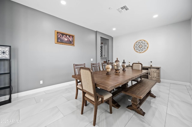 8017 S 143rd Ave, Goodyear, AZ 85338 - dining room with light marble finish flooring and recessed lighting