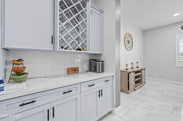 8017 S 143rd Ave, Goodyear, AZ 85338 - indoor dry bar featuring tasteful backsplash and recessed lighting