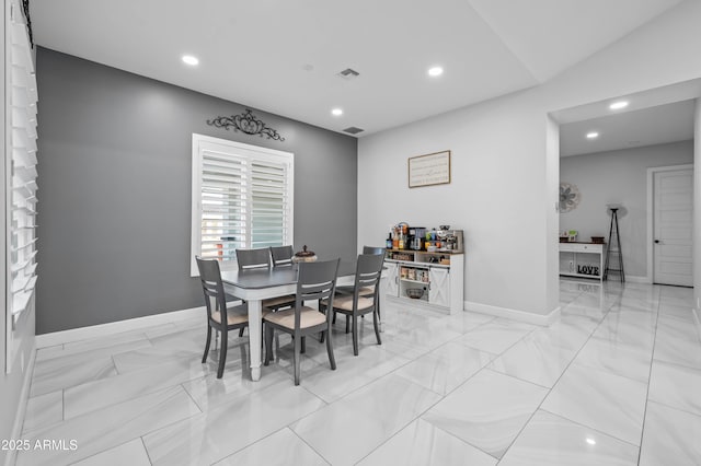 8017 S 143rd Ave, Goodyear, AZ 85338 - dining space with recessed lighting and light marble finish floors