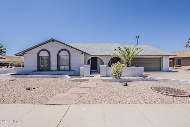 2307 W Nido Ave, Mesa, AZ 85202 - view of front of property with brick siding, concrete driveway, and an attached garage