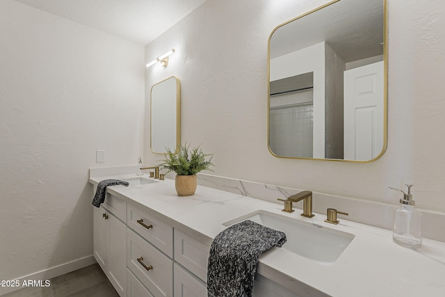 2307 W Nido Ave, Mesa, AZ 85202 - bathroom with double vanity and baseboards