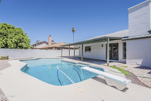 2307 W Nido Ave, Mesa, AZ 85202 - view of swimming pool with a fenced backyard, a diving board, and a patio