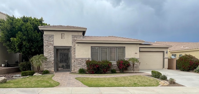 prairie-style house featuring a garage