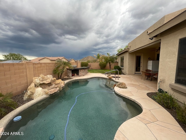 view of pool with a patio area