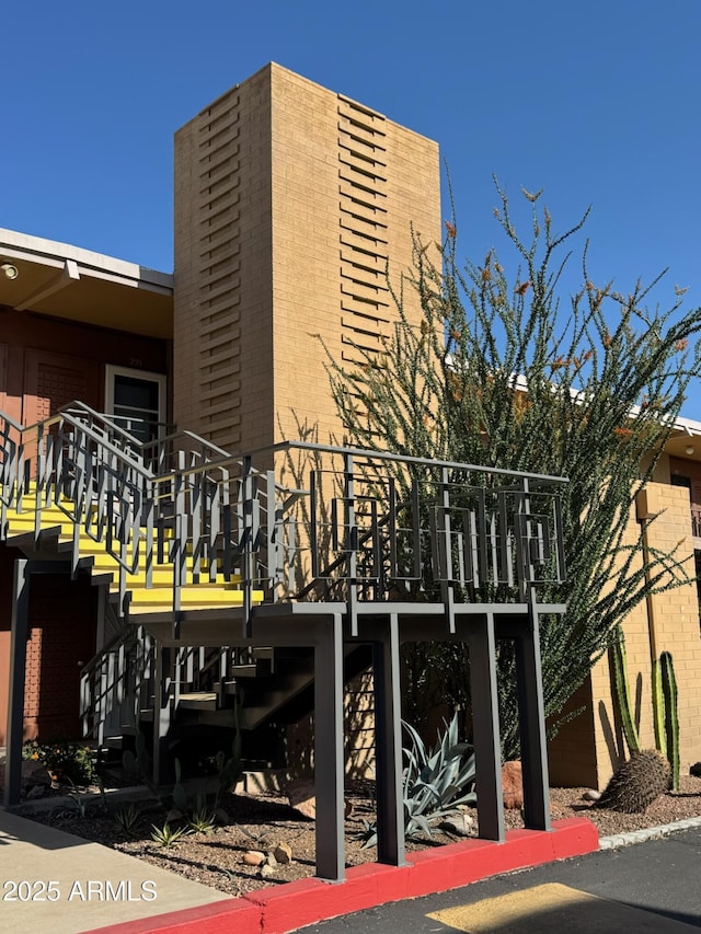 6125 E Indian School Rd Unit 152, Scottsdale, AZ 85251 - view of property with stairway