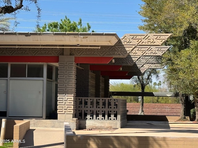 6125 E Indian School Rd Unit 152, Scottsdale, AZ 85251 - exterior space featuring stone siding
