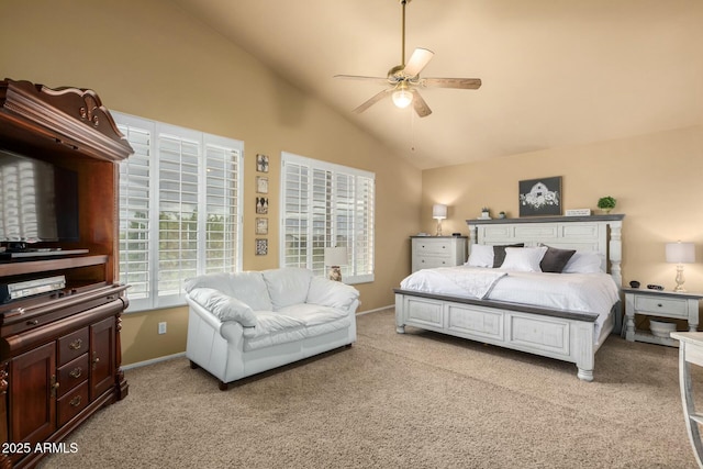 bedroom with baseboards, lofted ceiling, light colored carpet, and a ceiling fan