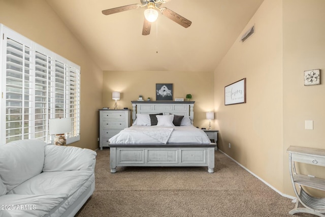 bedroom with baseboards, carpet floors, a ceiling fan, and vaulted ceiling