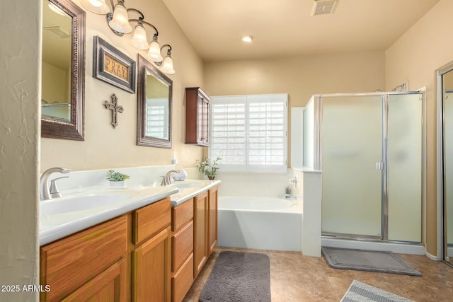 full bath with a stall shower, visible vents, and a sink