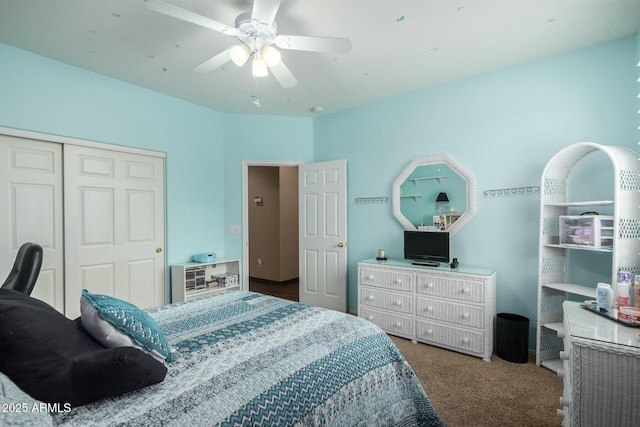 bedroom featuring a closet, carpet flooring, and ceiling fan