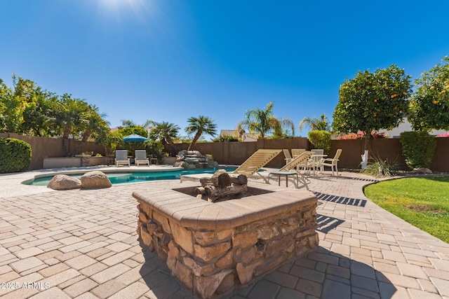 view of swimming pool with a fenced in pool, a patio, and a fenced backyard