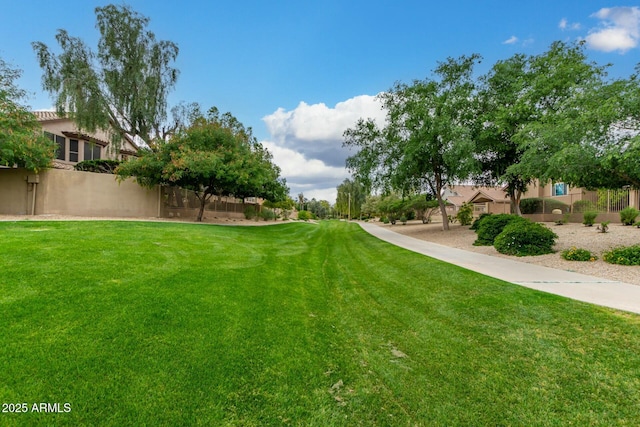 view of yard with fence