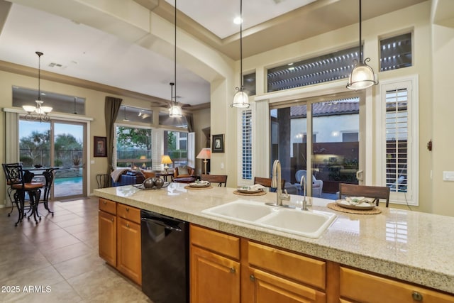 kitchen with dishwasher, an inviting chandelier, sink, hanging light fixtures, and light tile patterned floors