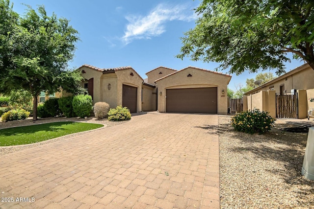 mediterranean / spanish-style house featuring a garage