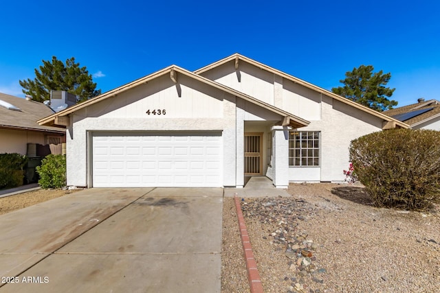 ranch-style house featuring a garage