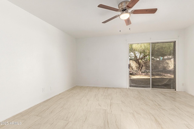 spare room featuring ceiling fan