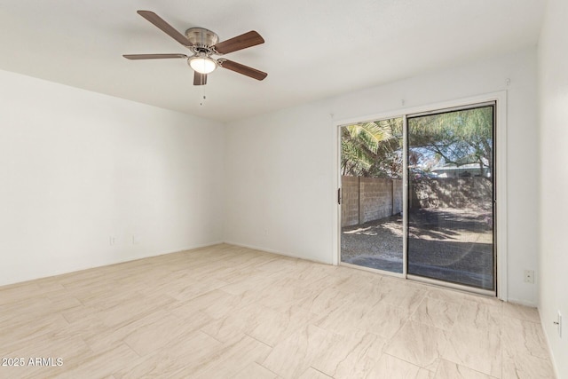 spare room featuring ceiling fan