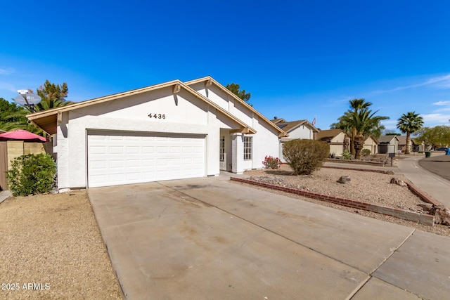 single story home with a garage