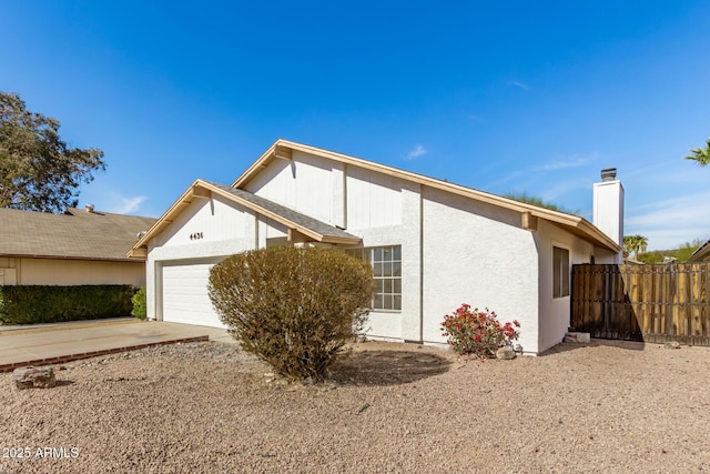 view of side of property featuring a garage