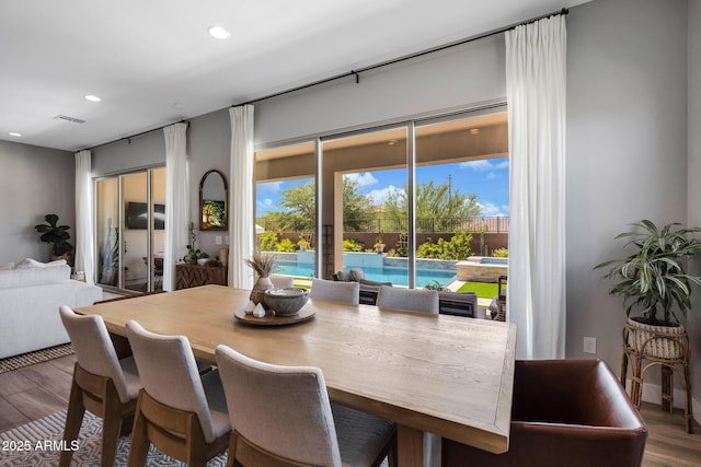 2037 E Fallen Leaf Ln, Phoenix, AZ 85024 - dining area featuring wood finished floors and recessed lighting