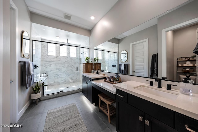 2037 E Fallen Leaf Ln, Phoenix, AZ 85024 - bathroom with vanity, a marble finish shower, and tile patterned flooring