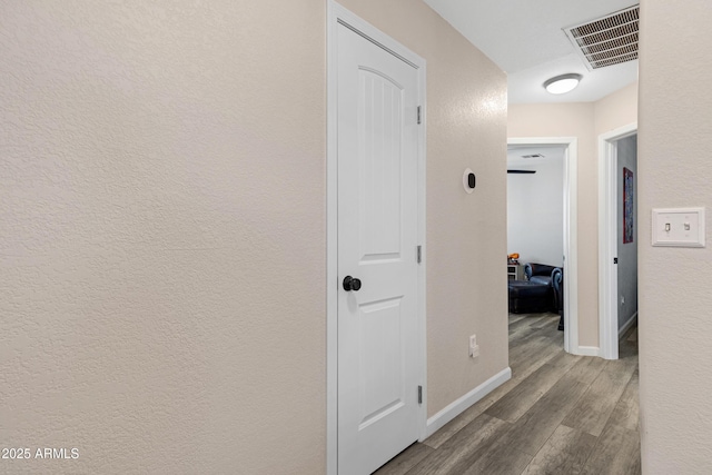 hall featuring wood-type flooring