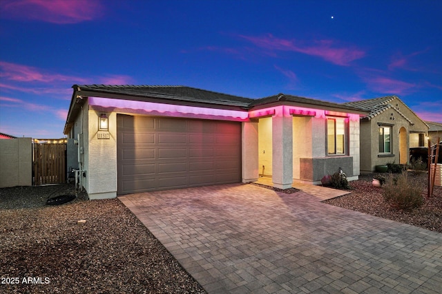 ranch-style house featuring a garage