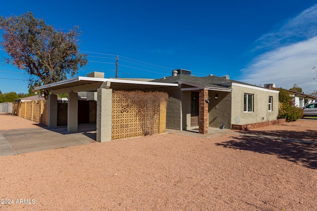 back of property featuring a patio